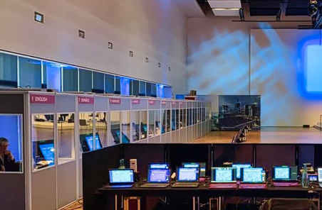large interpreting hub at the customer's premises with eleven interpreting booths and a large sound control room