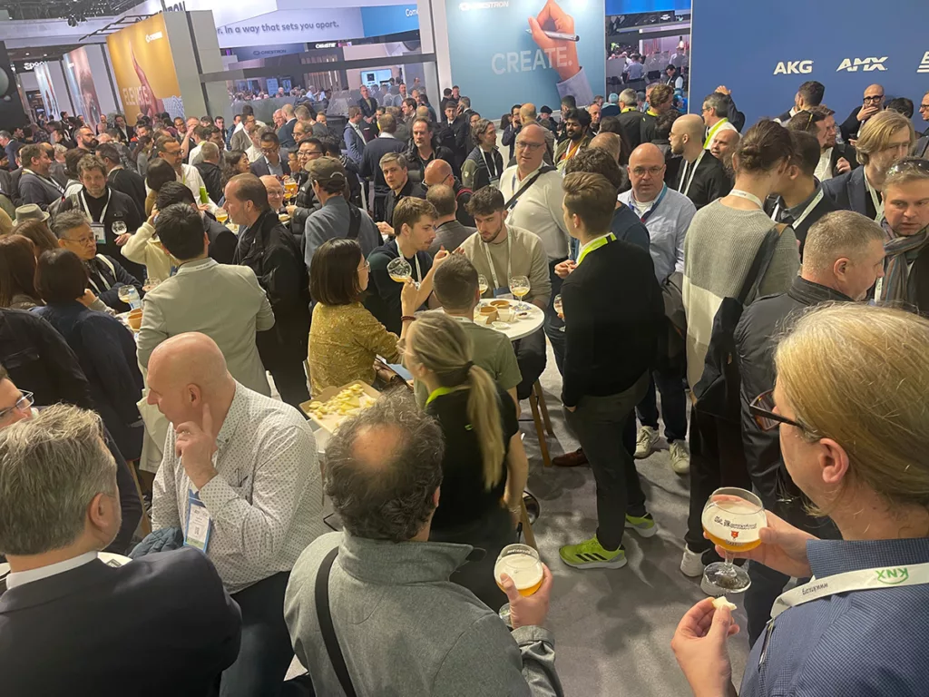 A view over the many visitors at the Televic stand party at ISE 2024.